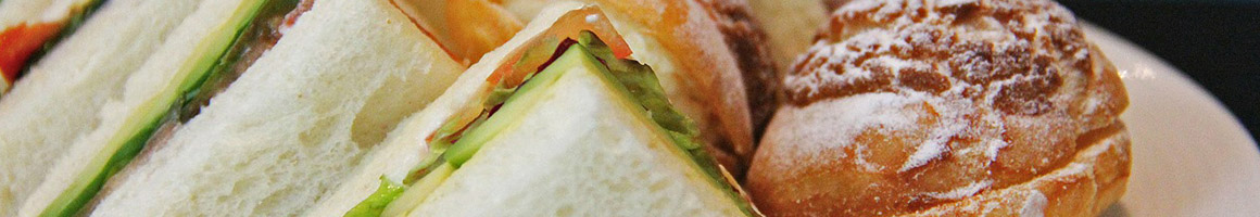Eating Burger Chicken Wing Sandwich at Brickstone Burgers and Brews.